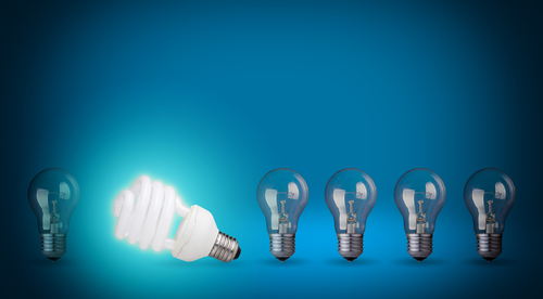 row of light bulbs and energy save bulb shutterstock_129363341