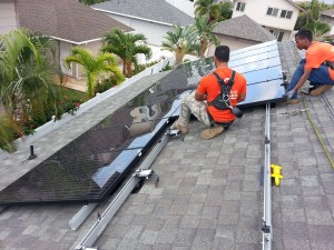 SolarEdge power optimizers are installed by Eco Solar on a rooftop in Hawaii. Module-level power electronics, like power optimizers, are growing in popularity. 