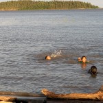 Children swim in Lake Athabasca on July 2 in Fort Chipewyan, Alberta.
Photo Credit: Dot Griffith