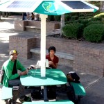 Students at Florida A&M University use solar picnic tables on campus. Photo credit: EnerFusion