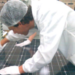 The solar panel quality inspection procedure at manufacturer Tianwei. Photo credit: Dricus/Flickr