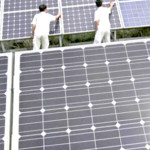 Workers clean solar panels at Yingli Green Energy Holdings in Baoding, China. Last year was a record year for China's solar industry with more installations than any country in any year. Photo credit: European Pressphoto Agency