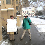 Activists in Colorado hold signs outside of a Colorado Oil and Gas Association hearing. Groups have launched a ballot initiative that could give residents control over fracking in their communities. Photo credit: sonya22/Flickr Creative Commons