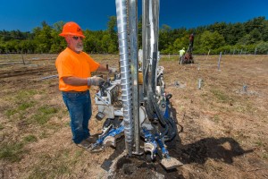 A TerraSmart ground screw installation.