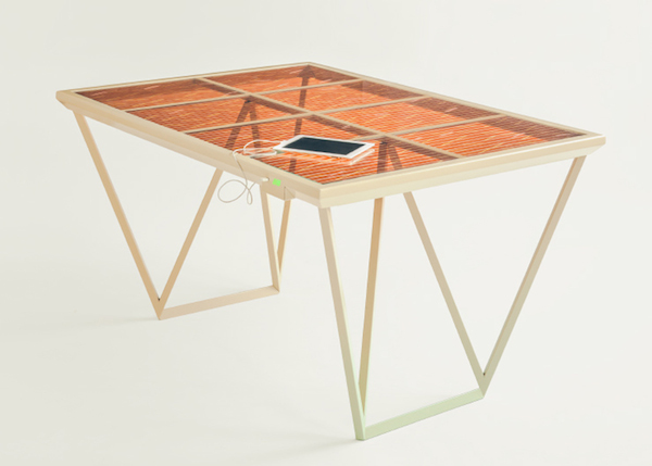 The-Current-Table-by-Marjan-van-Aubel-features-a-solar-panel-for-charging-mobile-phones_dezeen_ss_1