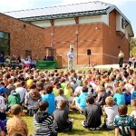 Boulder Valley School District students are introduced to their new solar panels last year in Colorado. The Natural Resources Defense Council's crowdfunding program will help a few schools around the country go solar. Photo credit: ZDS Communications